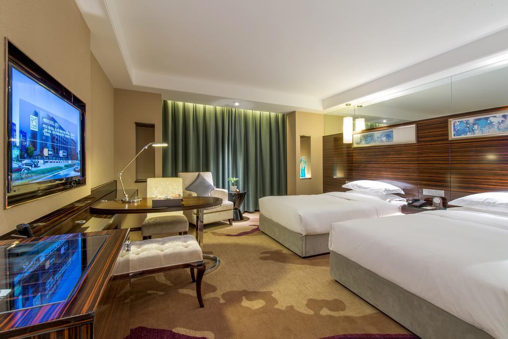 Longda Hotel Changchun Værelse billede