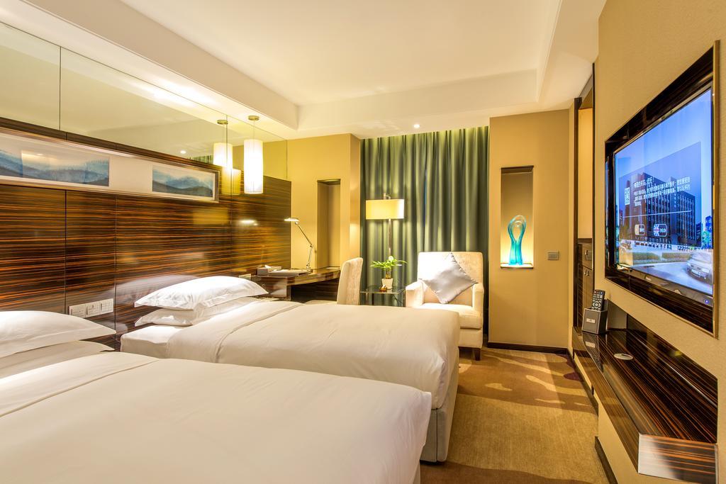 Longda Hotel Changchun Værelse billede