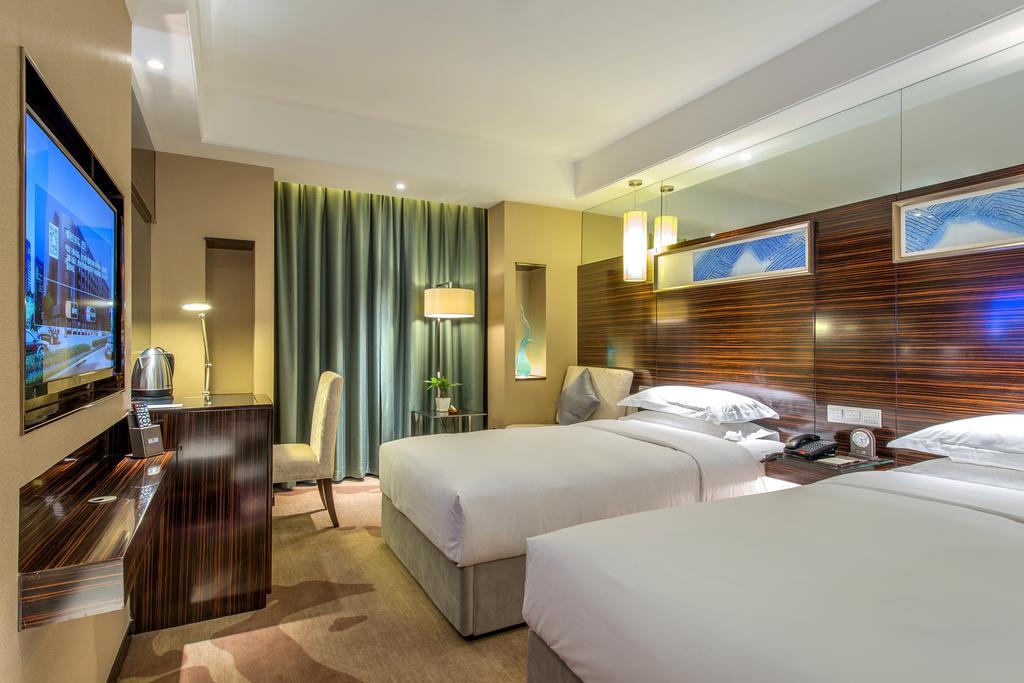 Longda Hotel Changchun Værelse billede
